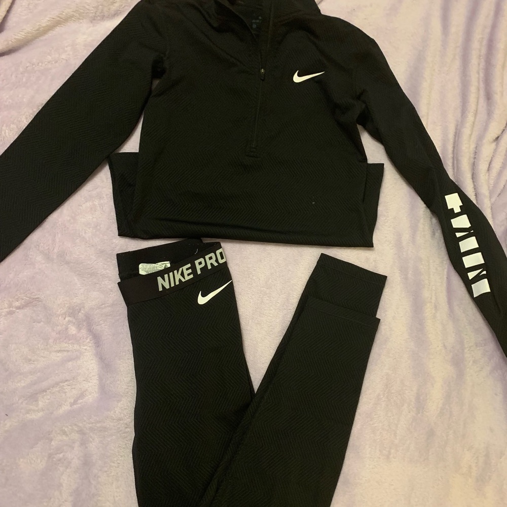 Nike running jacket and leggings.